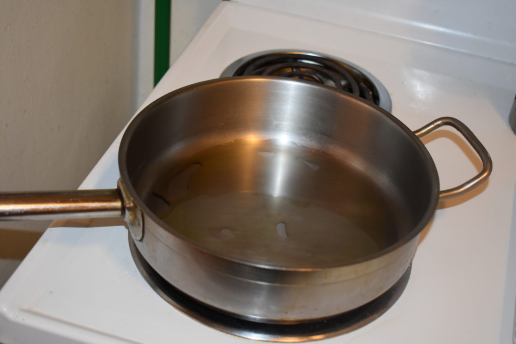 heating oil in a pan